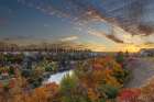 Sunset skies over autumn color along the Spokane River in Spokane, Washington State, USA Art Print